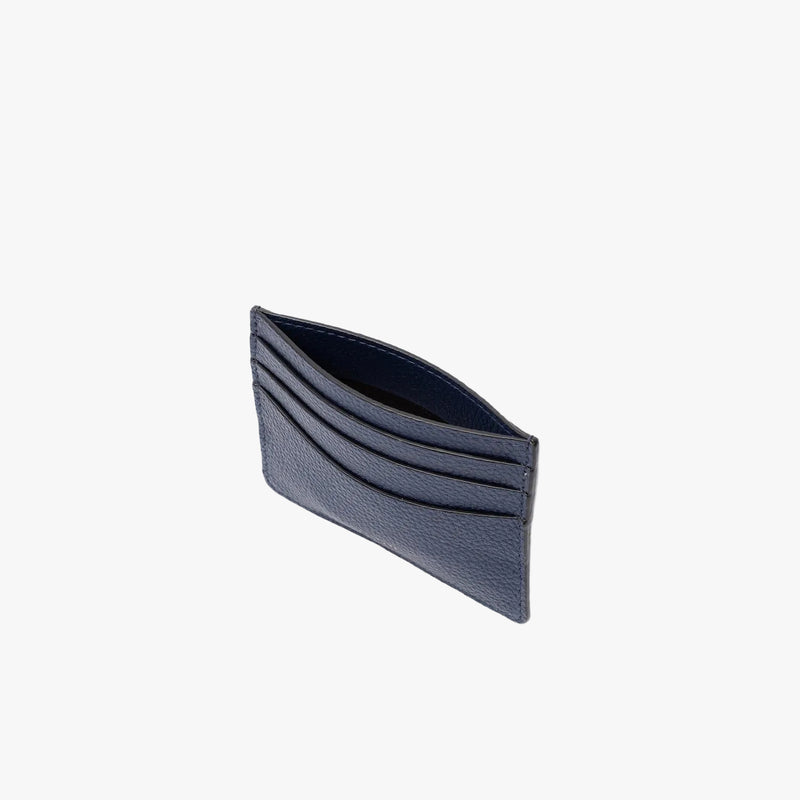 Top view of STOW London's Cardholder in Navy pebbled leather on a light grey background featuring all the different sized slip pockets