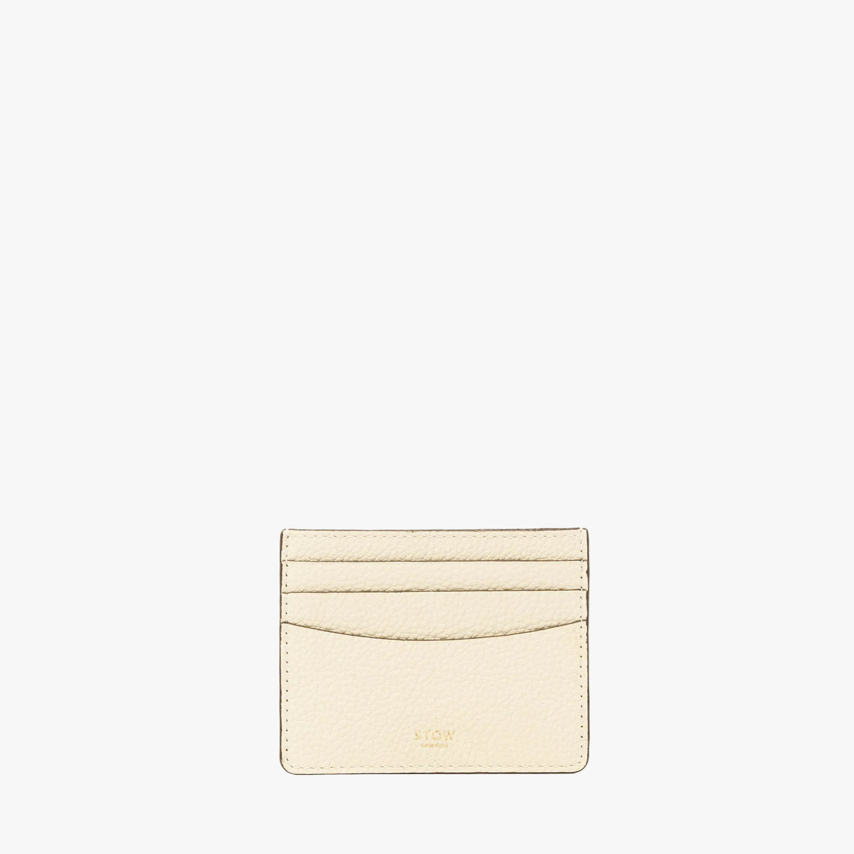 STOW London's Cardholder in Spring Moon pebbled leather on a light grey background featuring a fine gold embossed logo on the front bottom. 