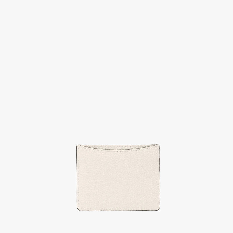 Back panel of STOW London's Cardholder in Spring Moon pebbled leather on a light grey background 