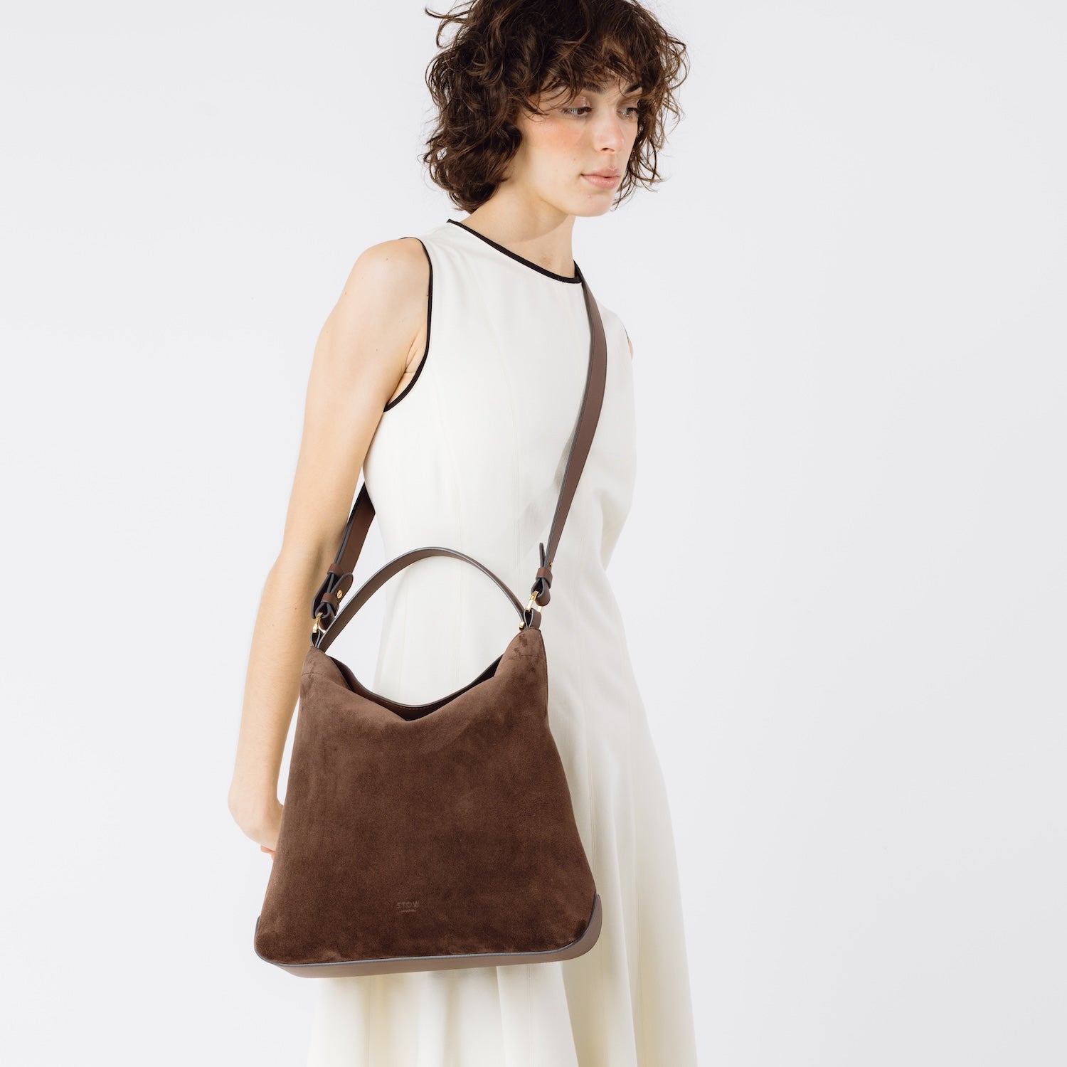 Curve Bag in Chocolate Suede Leather from STOW London