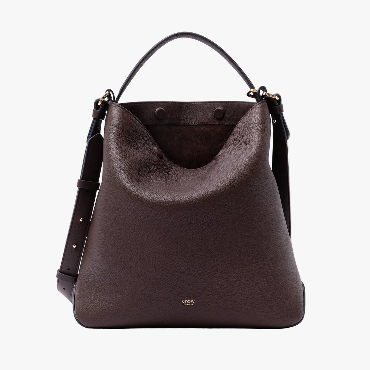 STOW London's Curve Bag in Espresso pebbled leather with magnets open showing the chocolate suede interior lining featuring the detachable crossbody strap and gold-coated stainless steel hardware on a light grey background