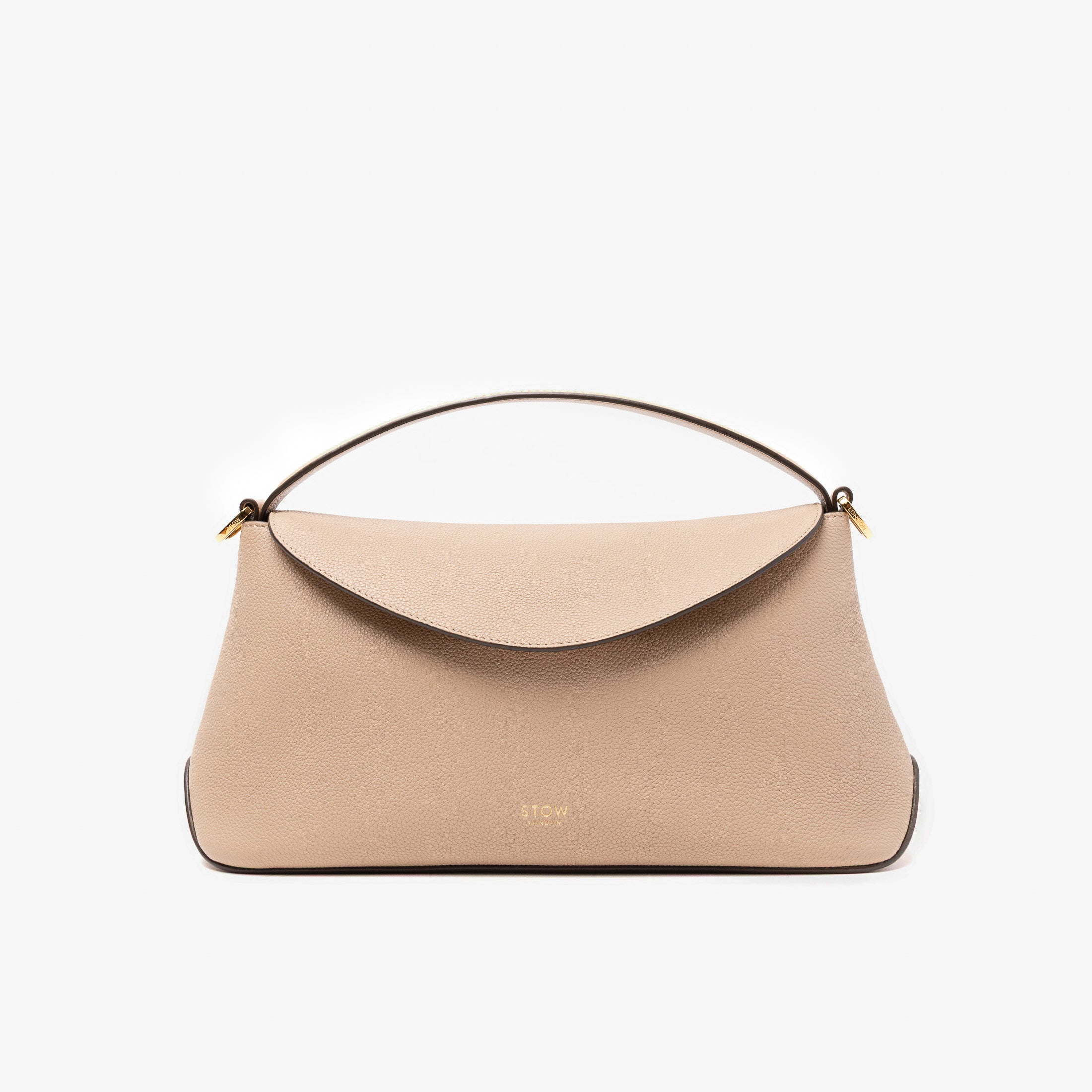 STOW London's East West in Camel pebbled leather featuring gold-coated stainless steel hardware on a light grey background