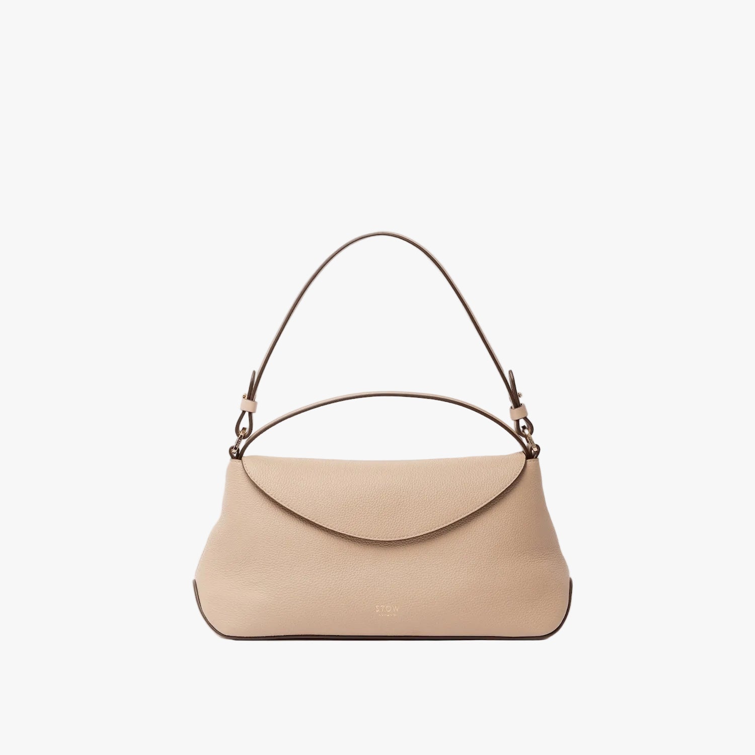 STOW London's East West in Camel leather on a light grey background featuring the detachable shoulder strap and top handle with gold hardware and details 