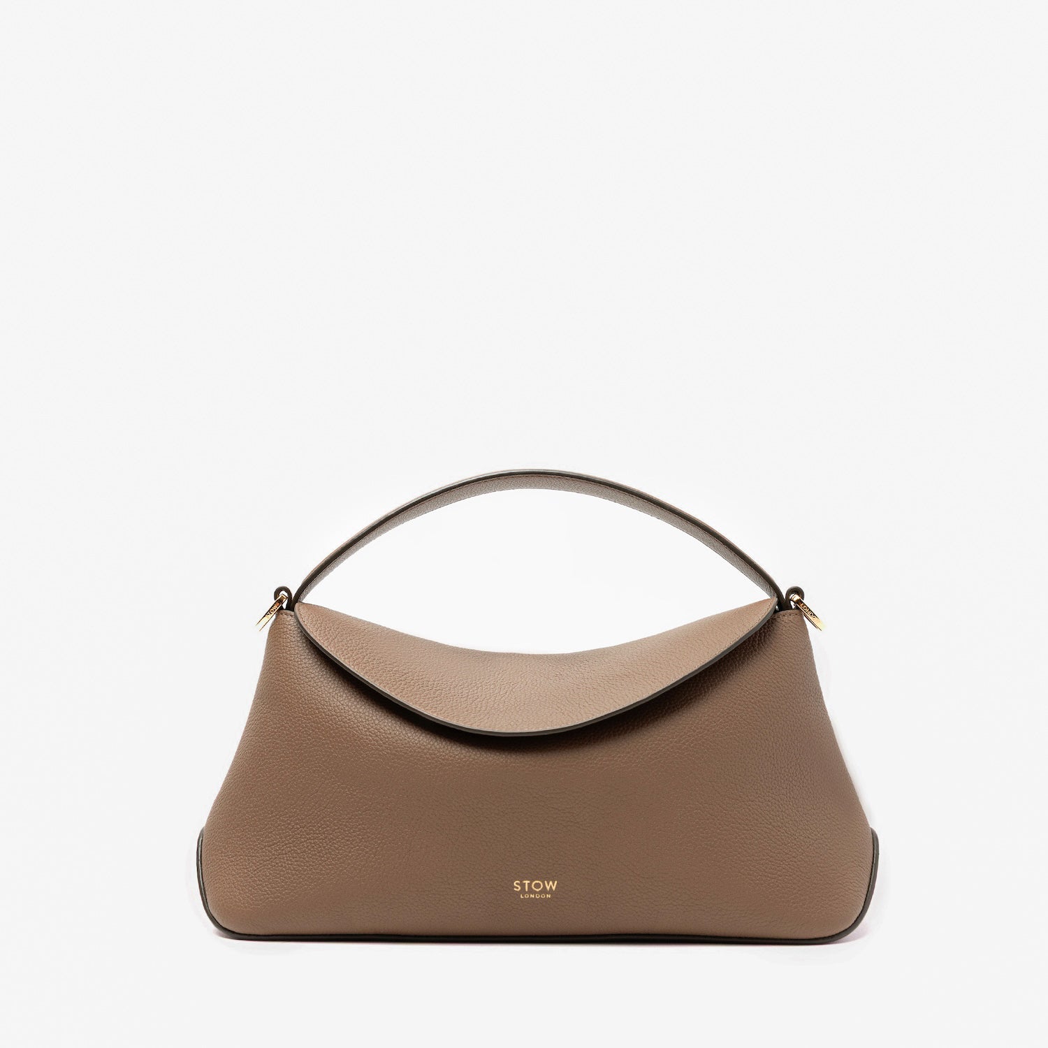 STOW London's East West in Mocha pebbled leather featuring gold-coated stainless steel hardware on a light grey background