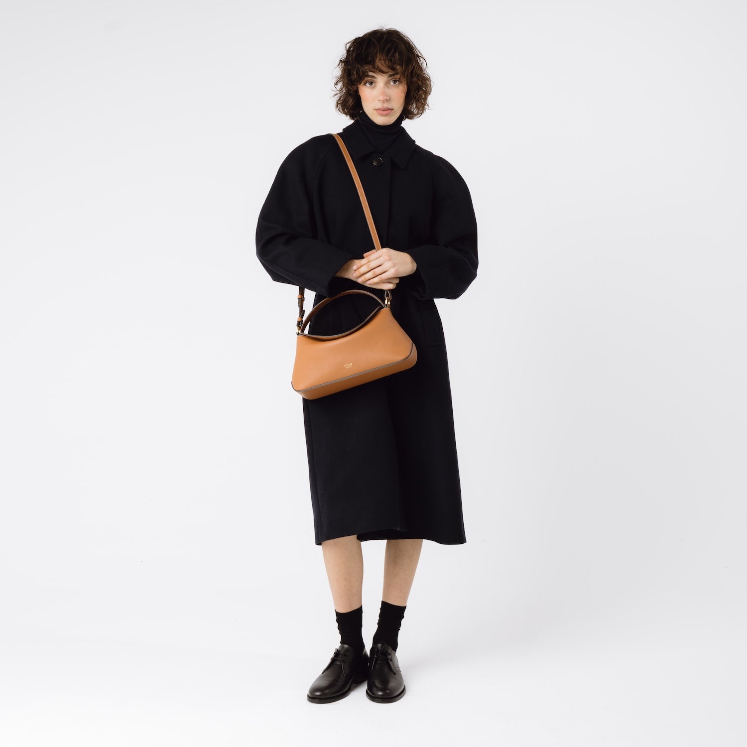 East West Curve Tasche