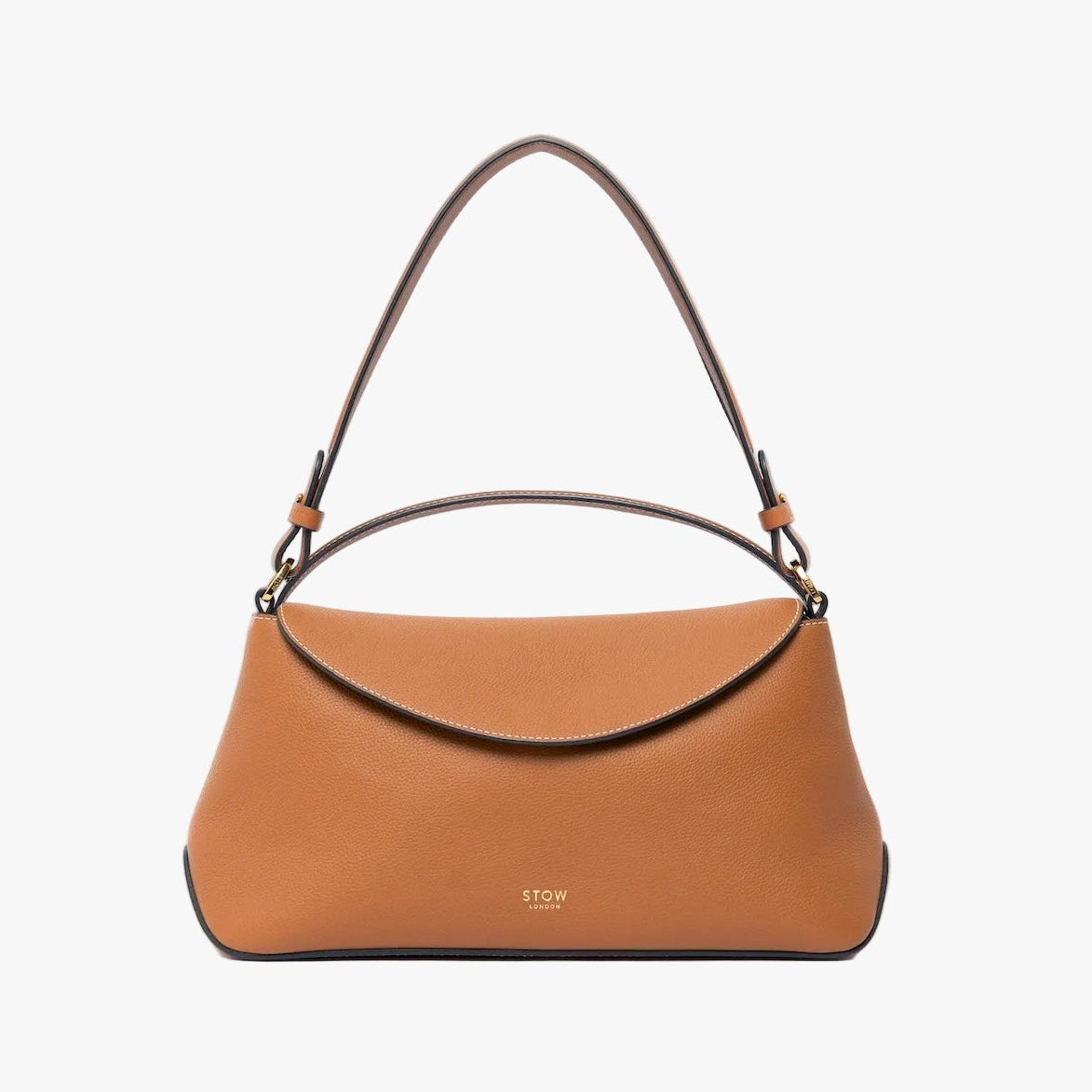 STOW London's East West and detachable shoulder strap in Earth Tan leather on a light grey background featuring gold hardware