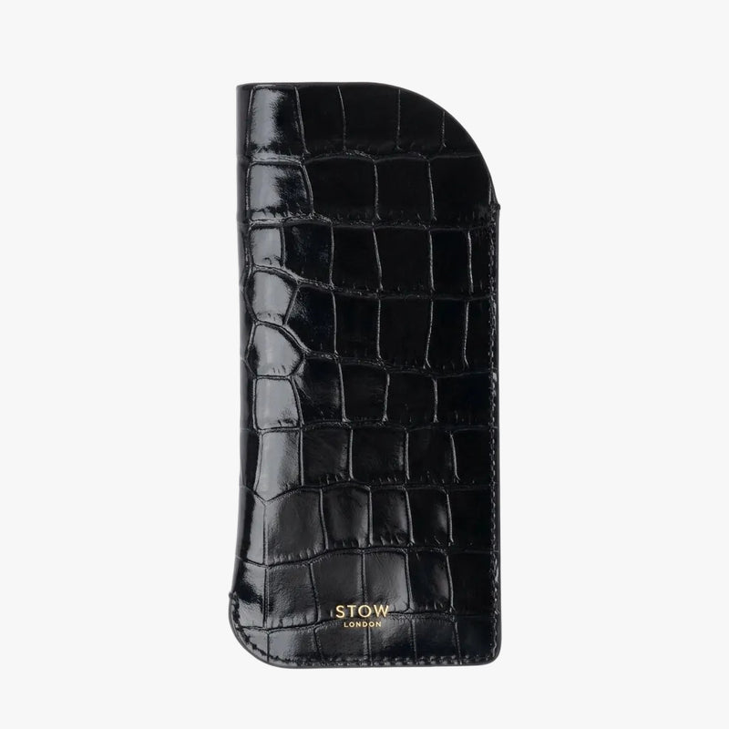 STOW London's Glasses Case in Burgundy Embossed Croc leather, featuring a gold logo on a light background