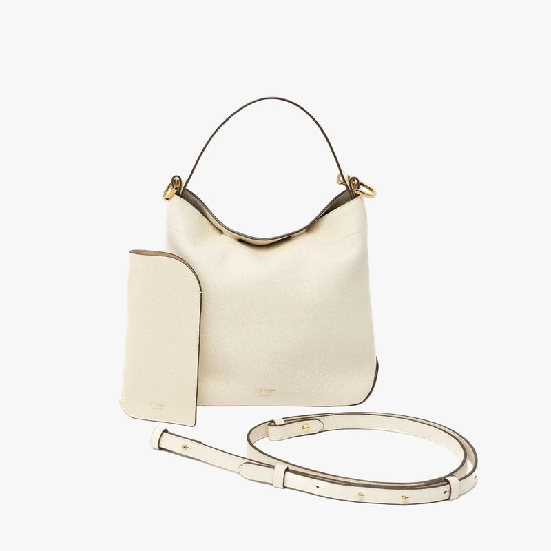 STOW London's Glasses Case in Spring Moon pebbled leather with the matching Midi Curve bag