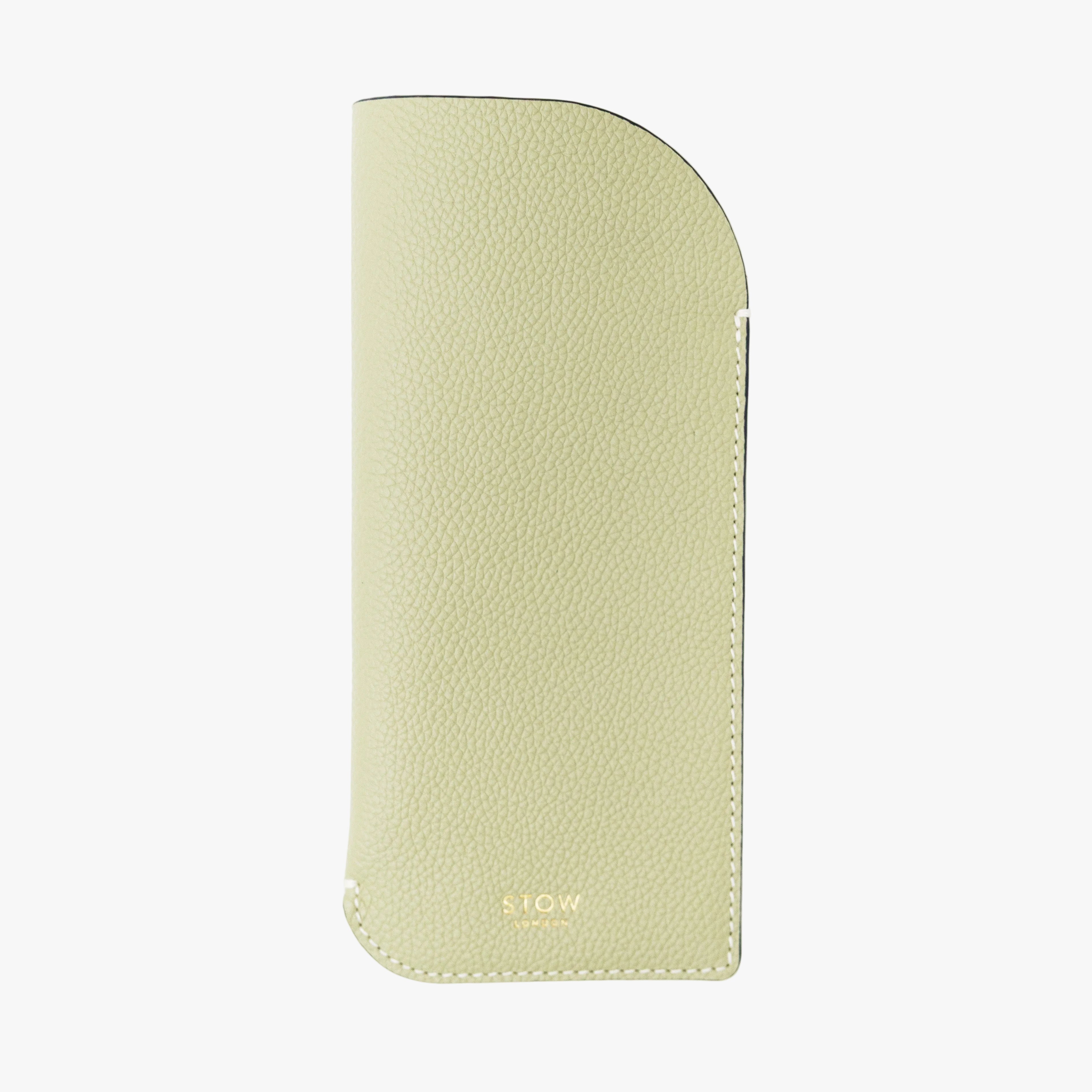 STOW London's Glasses Case in Pale Green pebbled leather, featuring a gold logo on a light grey background