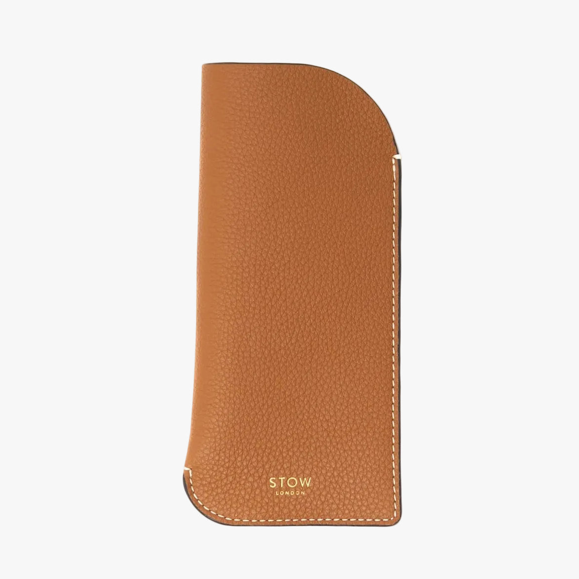 STOW London's Glasses Case in Earth Tan pebbled leather on a light grey background with a small logo on the bottom