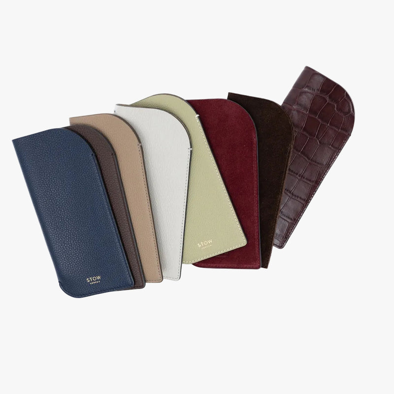 STOW London's Glasses Cases on a light grey background featuring three different leather materials