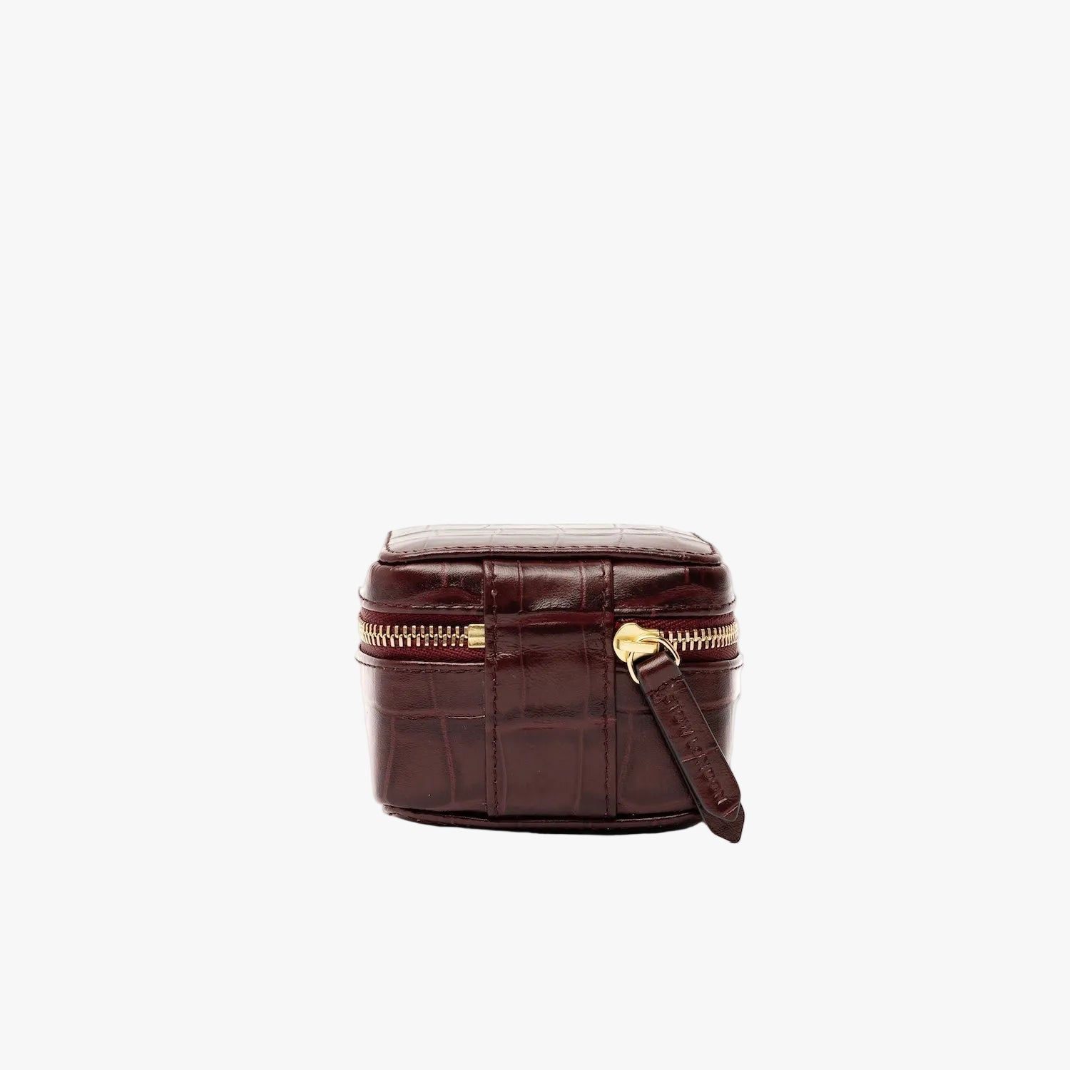 Back of STOW London's Hester Jewellery Case in Burgundy Embossed Croc leather on a light grey background featuring a YKK Natulon zip 