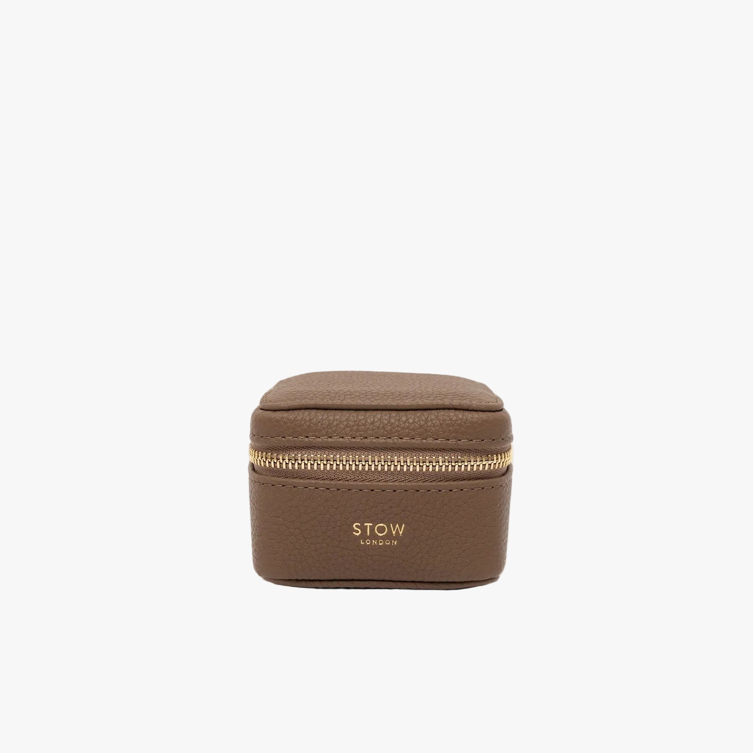 STOW London's Hester Jewellery Case in Mocha pebbled leather on a light grey background featuring a YKK Natulon zip and fine gold embossed logo on the front