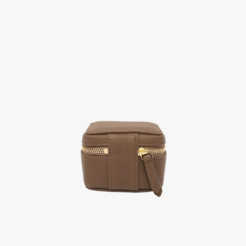 Back of STOW London's Hester Jewellery Case in Mocha pebbled leather on a light grey background featuring a YKK Natulon zip 