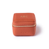 STOW Leather Hester Essentials Case in Clay Orange colour with personalised initials on the top.