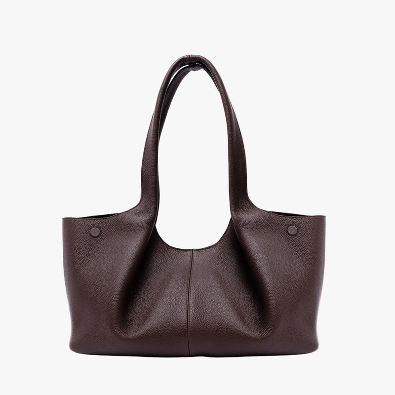 Back of STOW London's Hobo Tote in Espresso pebbled leather on a light grey background featuring a pleated back panel 