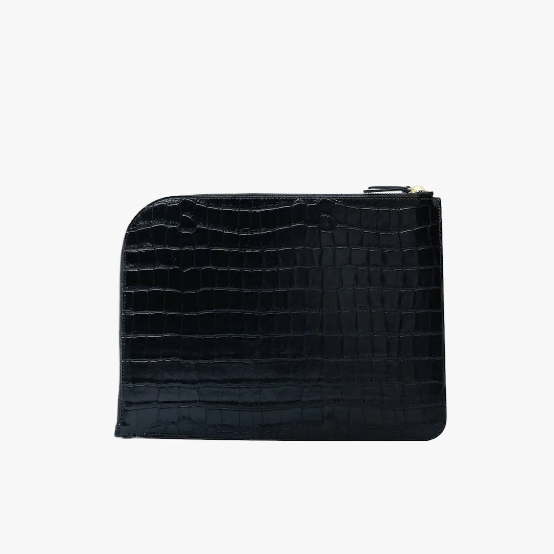Back panel of STOW London's Ipad Sleeve in Black Embossed Croc leather on a light grey background featuring a YKK Natulon Zip closure