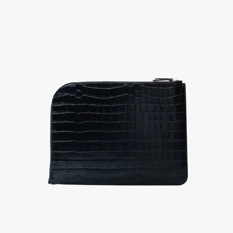 Back panel of STOW London's Ipad Sleeve in Black Embossed Croc leather on a light grey background featuring a YKK Natulon Zip closure
