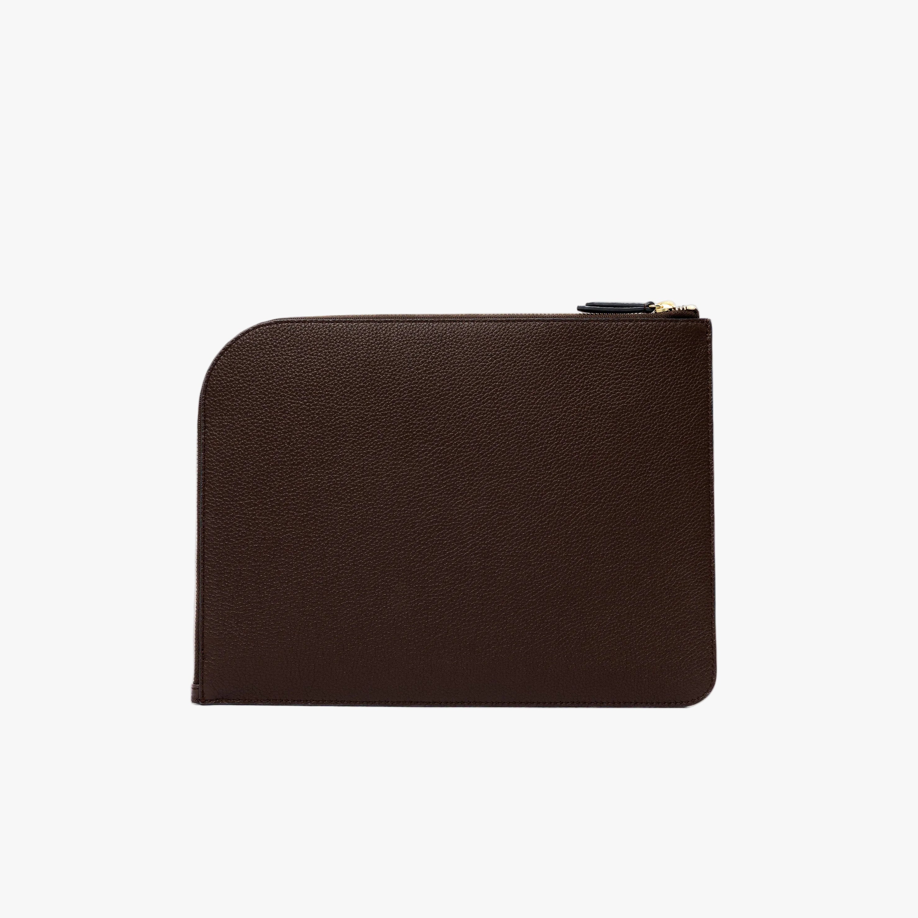 Back panel of STOW London's Ipad Sleeve in Espresso pebbled leather on a light grey background featuring a YKK Natulon Zip closure