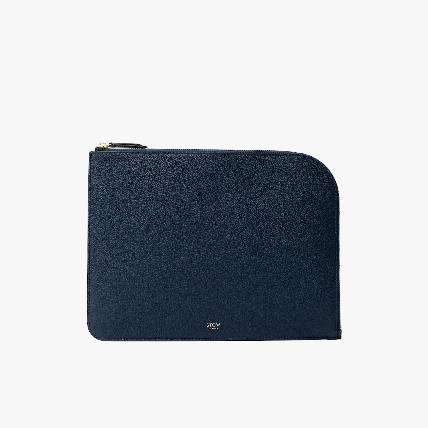 STOW London's Ipad Sleeve in Navy pebbled leather on a light grey background featuring a YKK Natulon Zip and a fine gold embossed logo on the front bottom. 