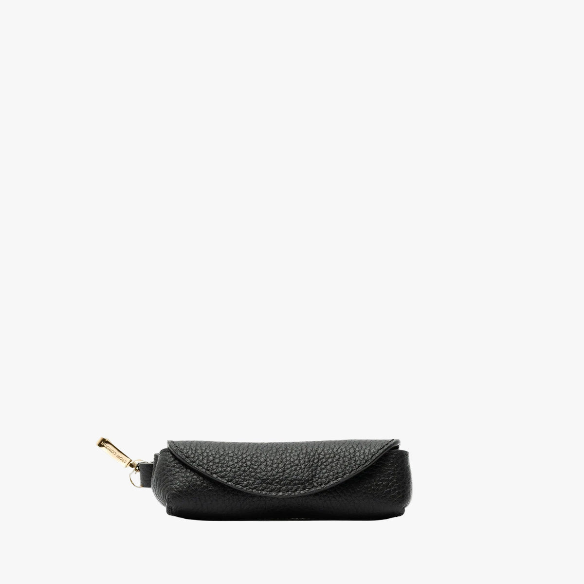 STOW London's Lipstick Case in Black pebbled leather featuring a gold-coated stainless steel clip on a light grey background