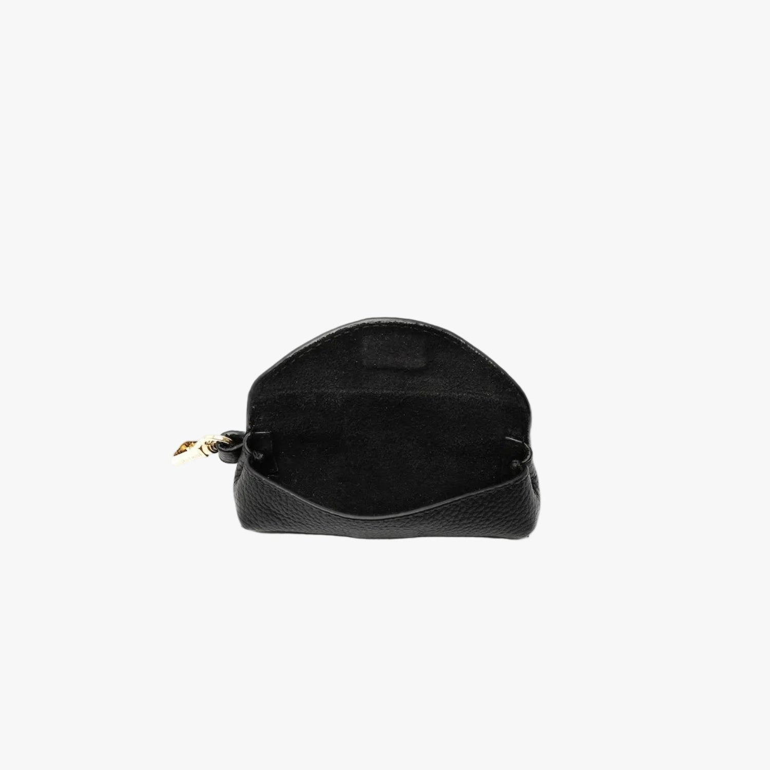 STOW London's Lipstick Case in Black pebbled leather with flap open showing magnetic closure and black suede interior featuring a gold-coated stainless steel clip and embossed logo on a light grey background