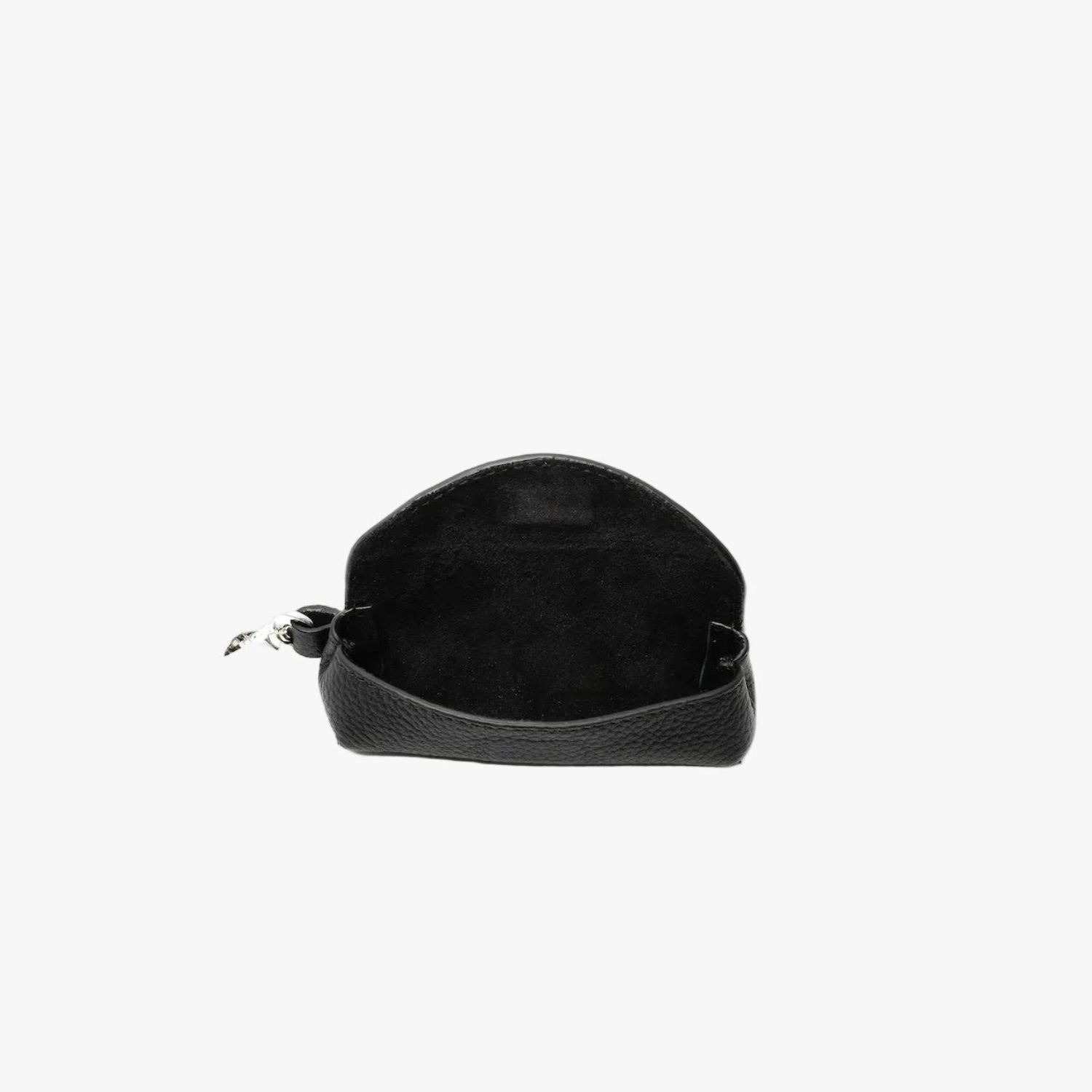 STOW London's Lipstick Case in Black pebbled leather with flap open showing hidden magnetic closure and black suede interior featuring a silver stainless steel clip on a light grey background