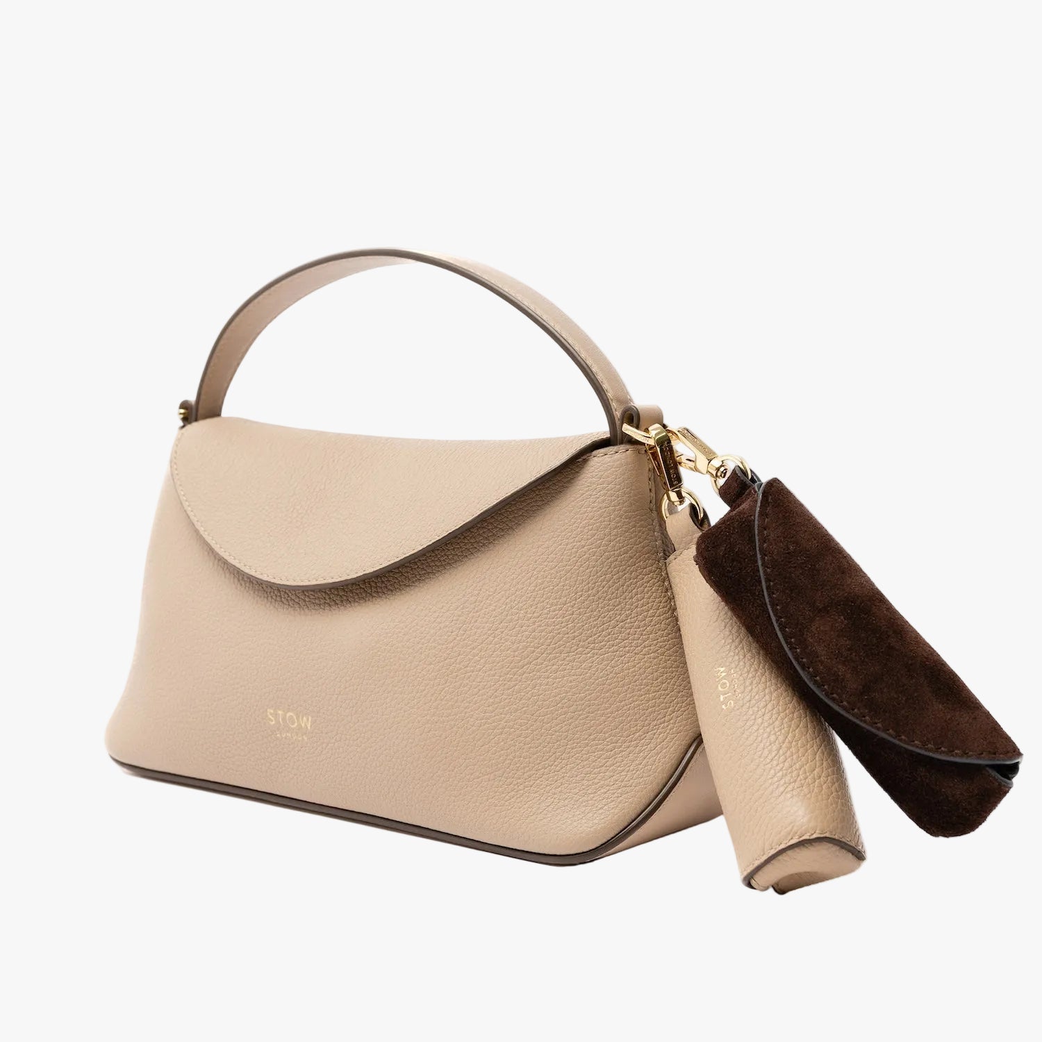 STOW London's Lipstick Case in Chocolate suede leather and camel pebbled leather attached to the Camel Mini East West on a light grey background featuring a gold-coated stainless steel clip