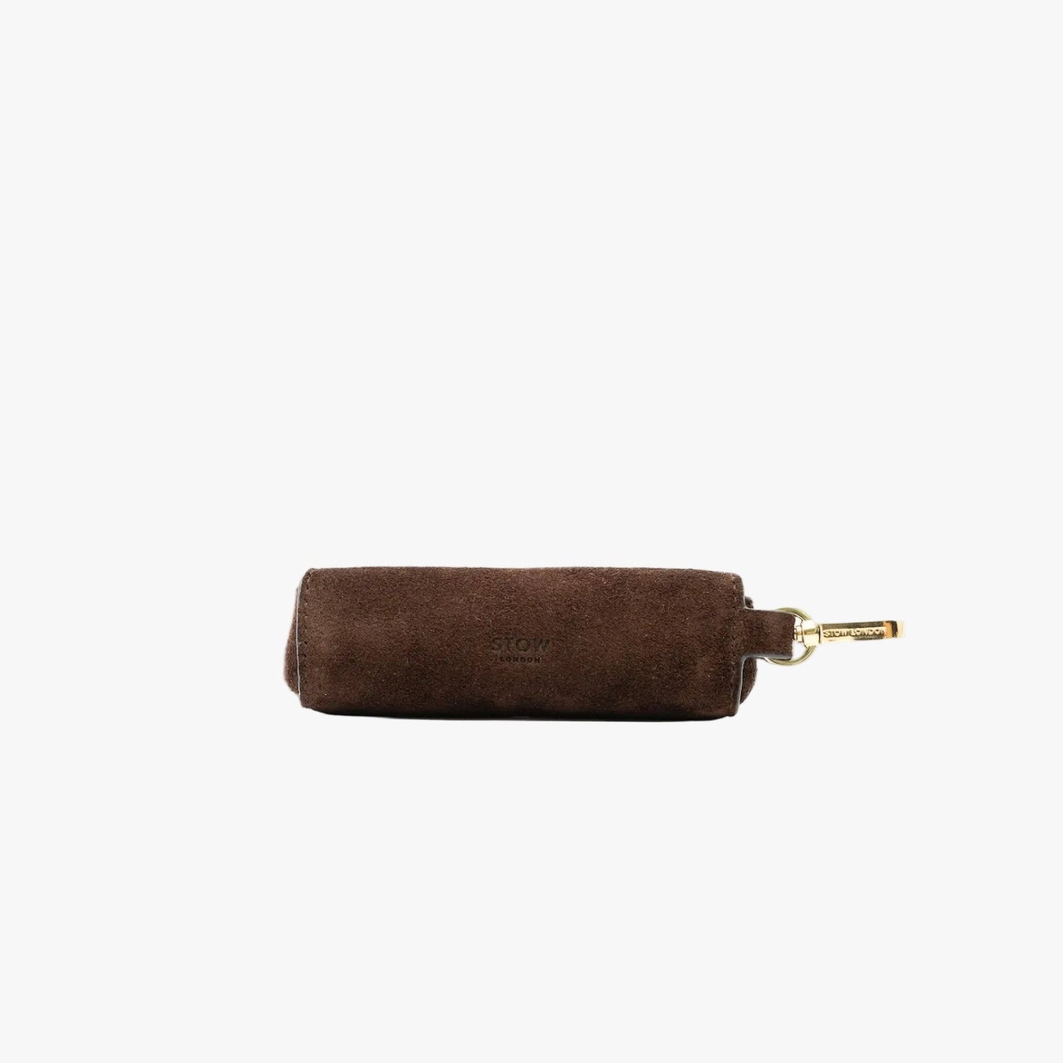 STOW London's Lipstick Case in Chocolate suede leather on a light grey background featuring a gold-coated stainless steel clip