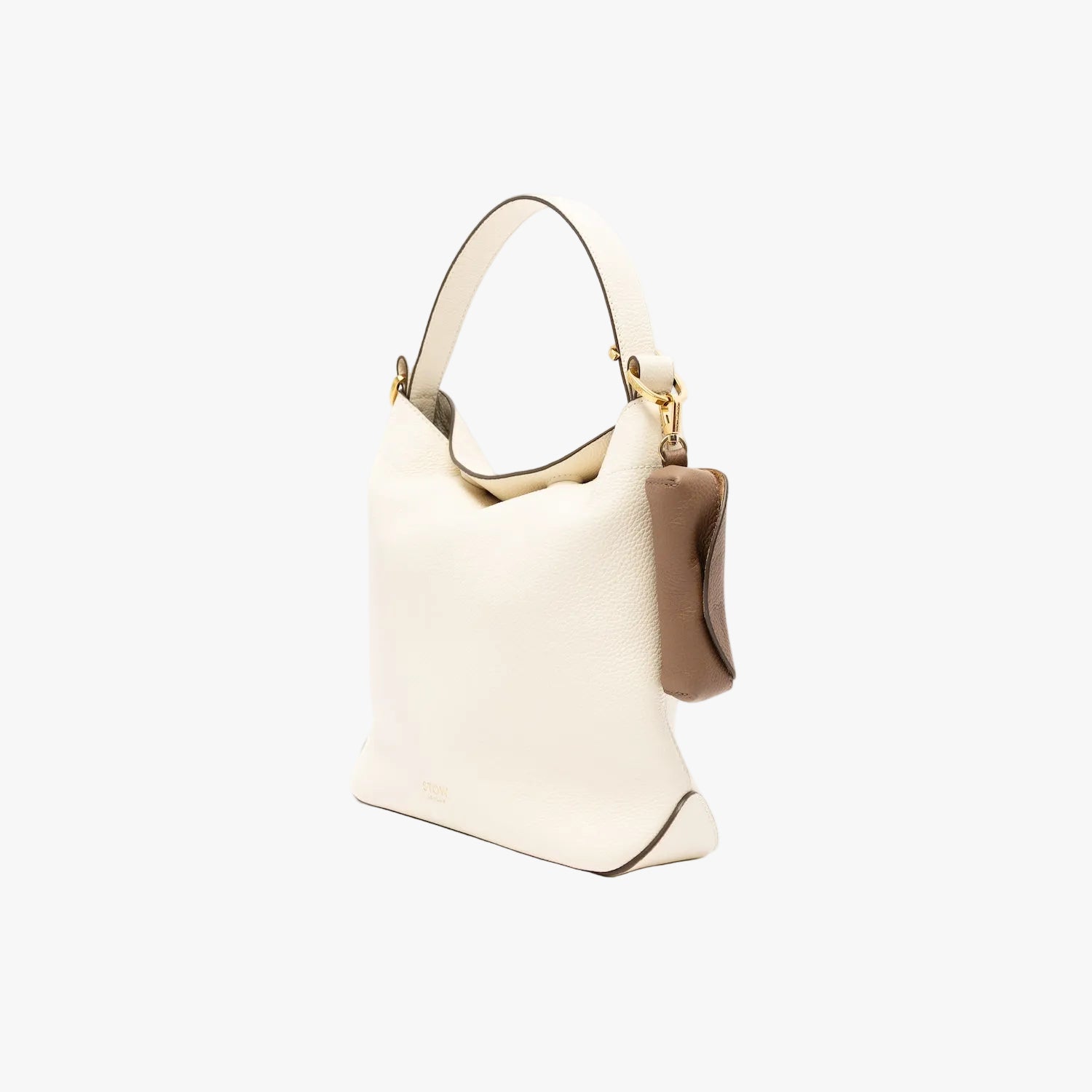 STOW London's Lipstick Case in Mocha pebbled leather on a light grey background attached to the Spring Moon Midi Curve Bag by its gold-coated stainless steel clip