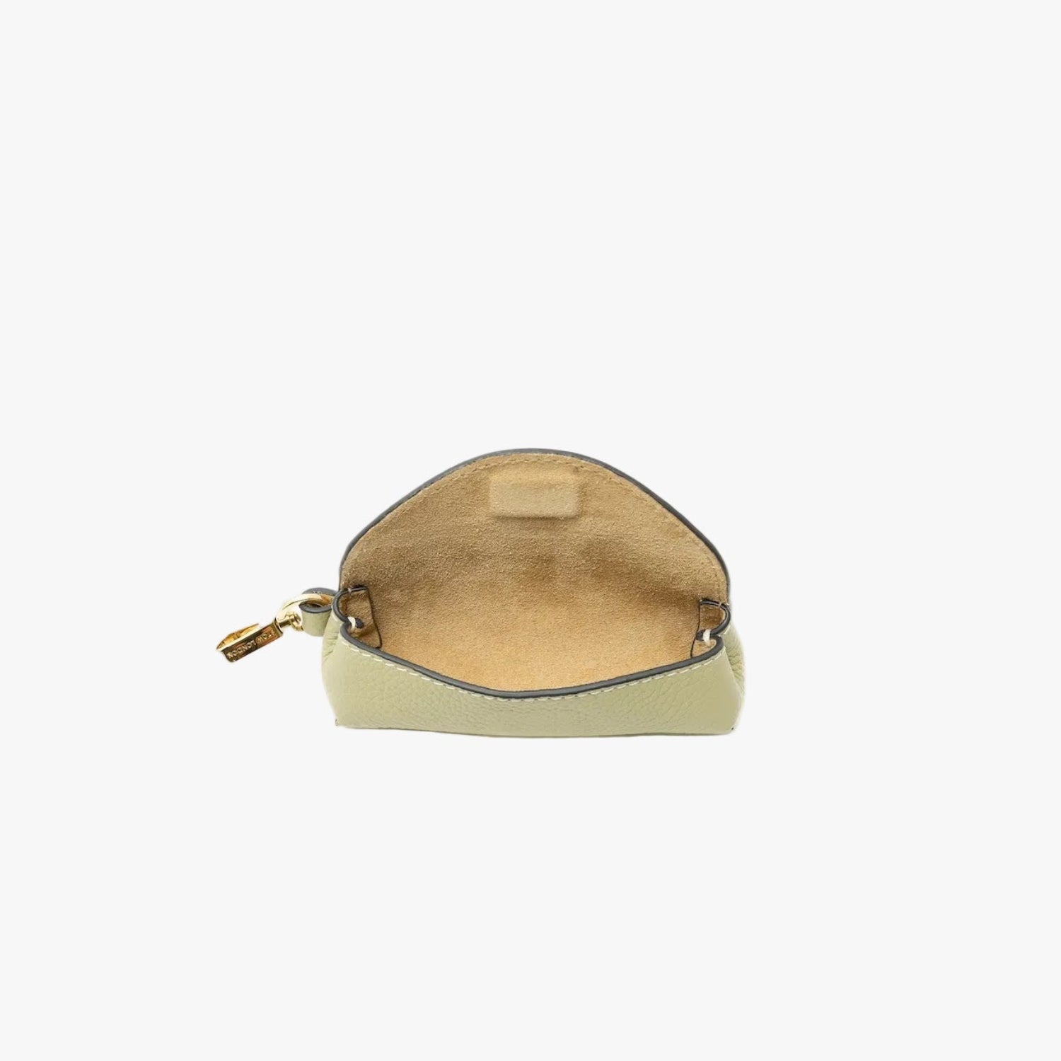STOW London's Lipstick Case in Pale Green pebbled leather with flap open showing hidden magnetic closure and suede interior lining featuring a gold-coated stainless steel clip on a light grey background