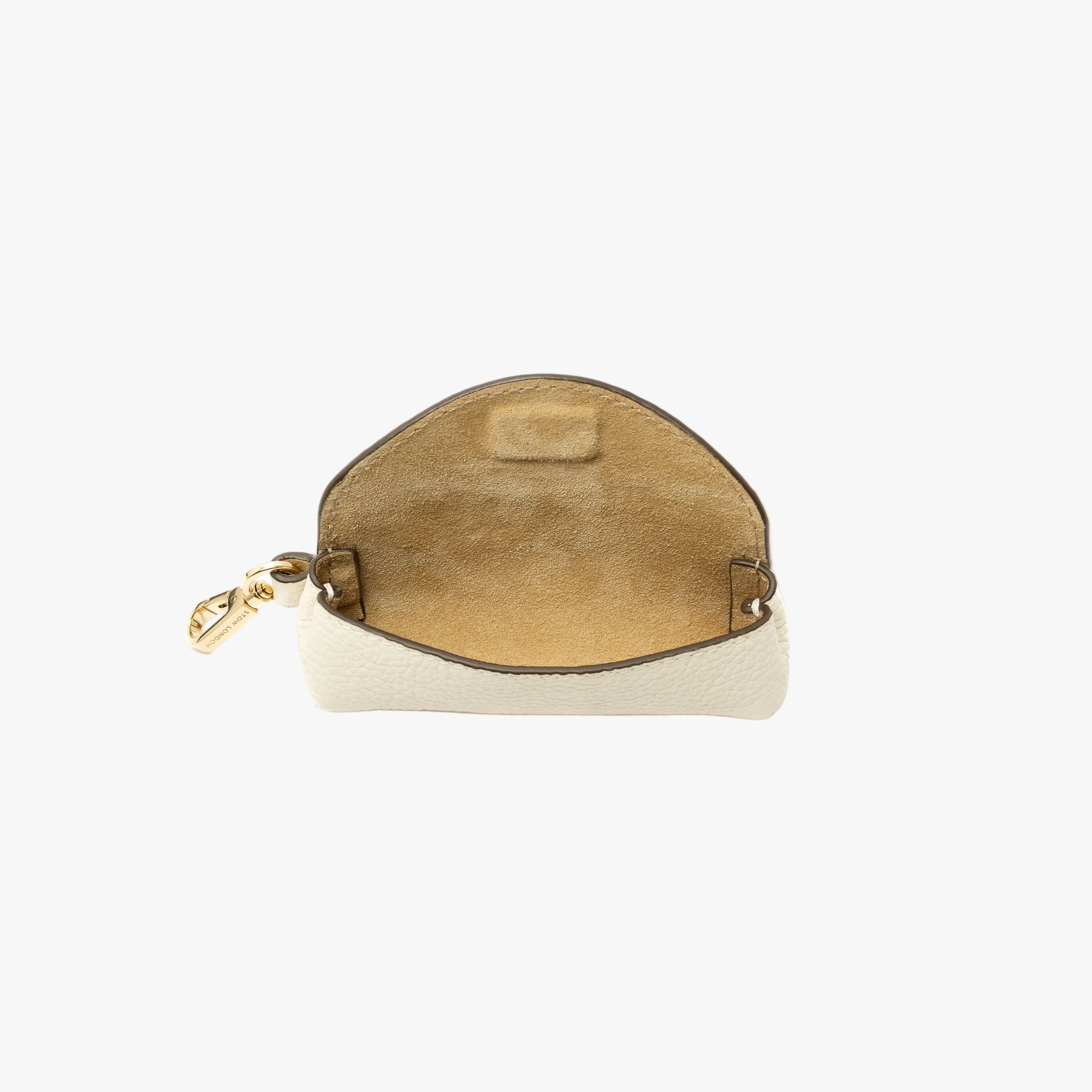 STOW London's Lipstick Case in Spring Moon pebbled leather with flap open showing the hidden magnetic closure and suede interior lining featuring a gold-coated stainless steel clip on a light grey background