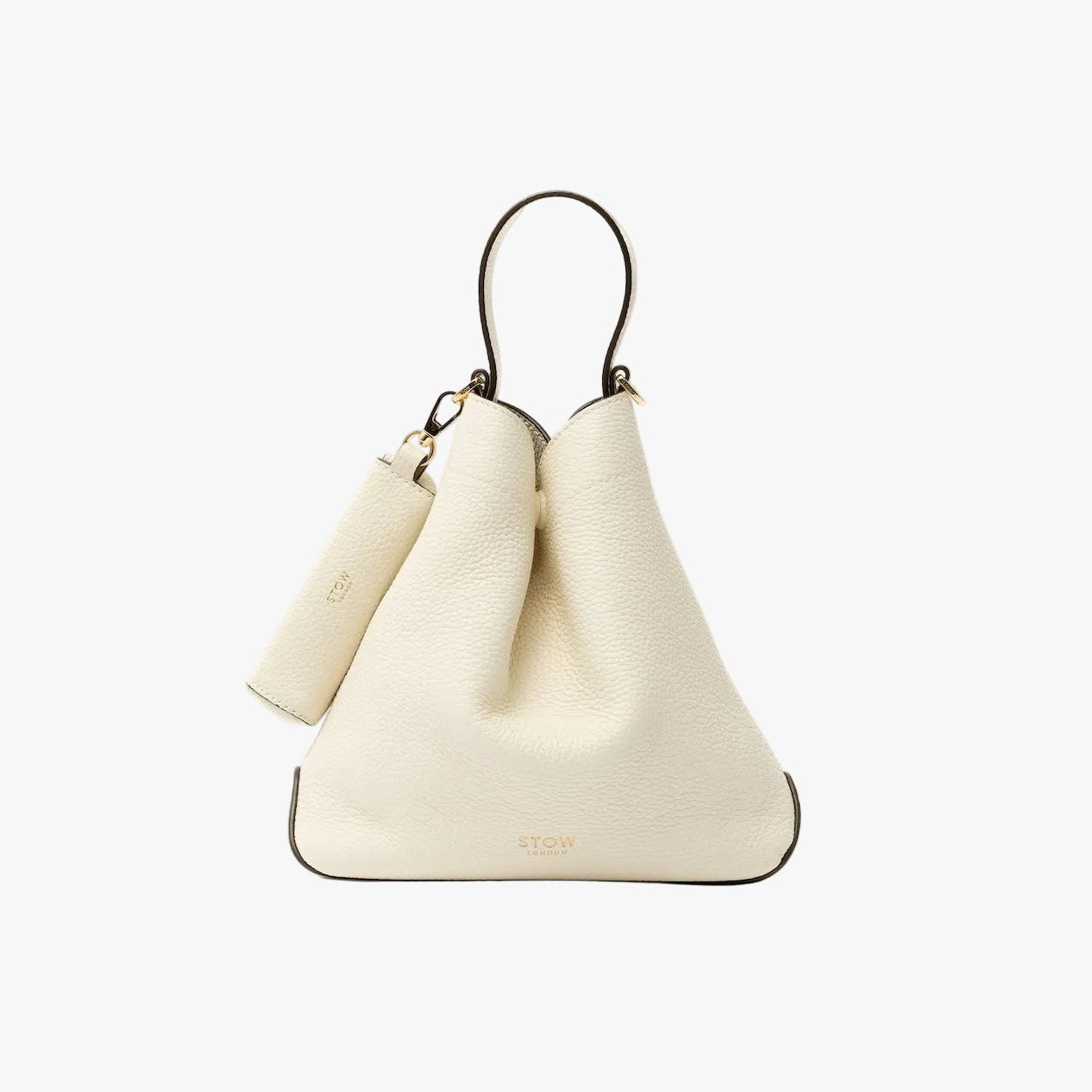 STOW London's Lipstick Case in Spring Moon pebbled leather featuring a gold-coated stainless steel clip on a light grey background
