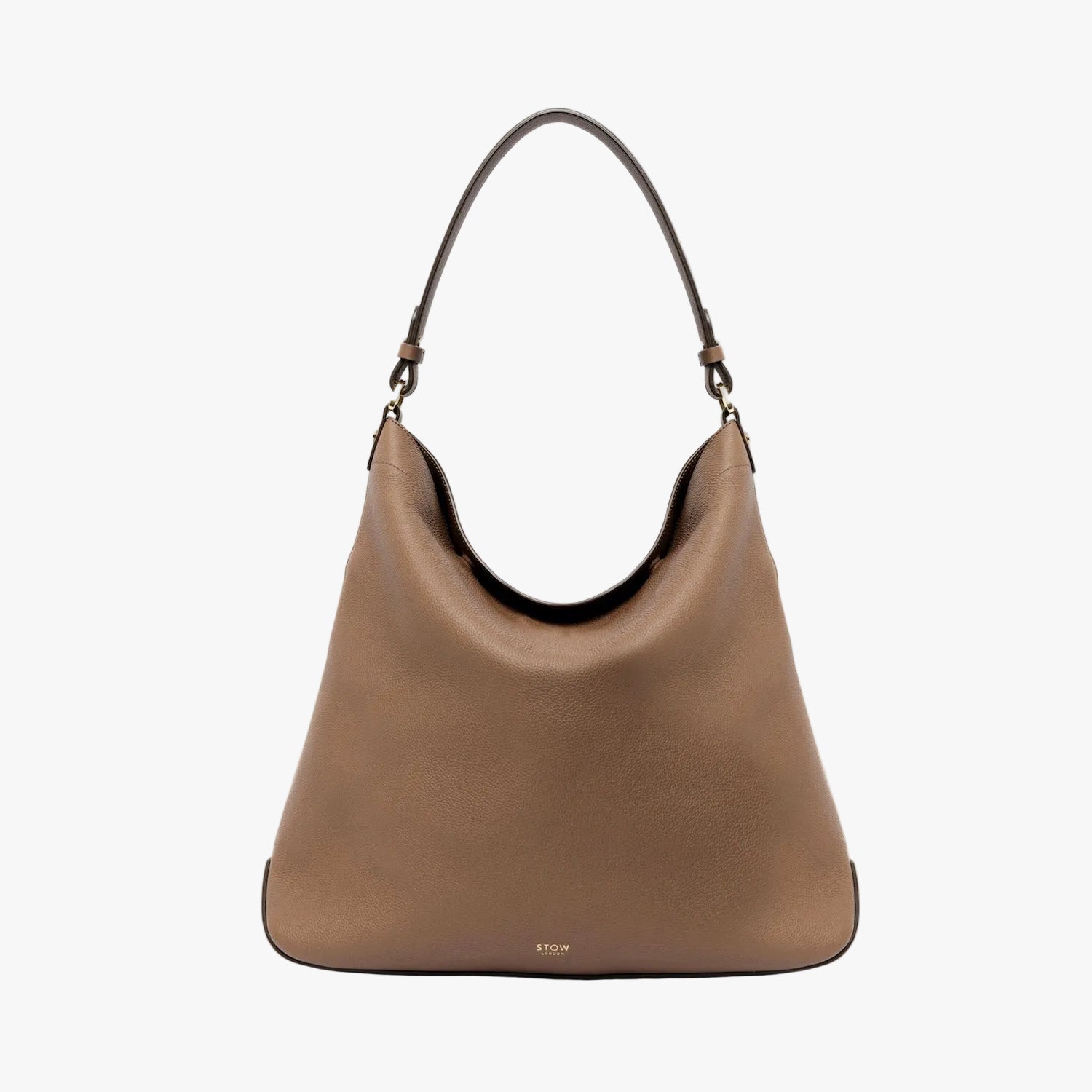STOW London's Maxi Curve bag in Mocha pebbled leather featuring gold-coated stainless steel hardware on a light grey background