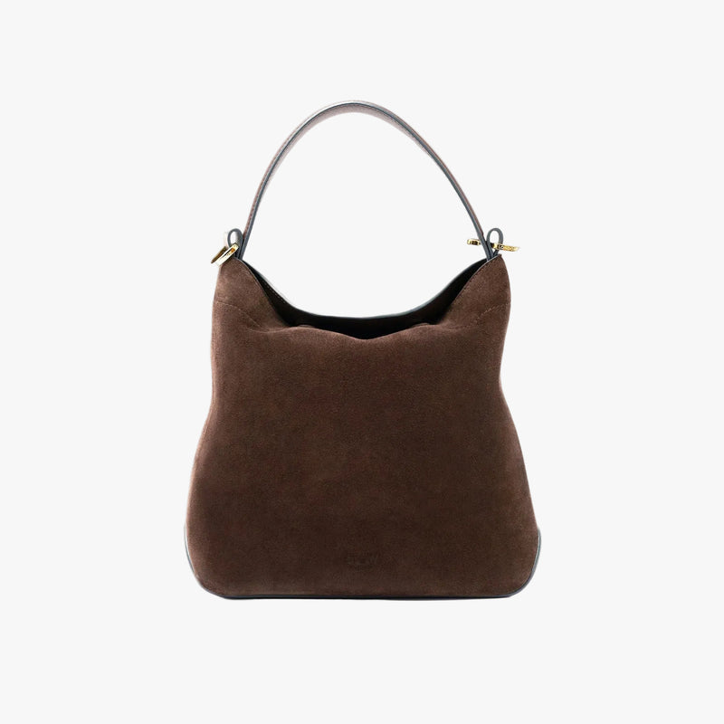 STOW London's Midi Curve in Chocolate suede leather styled as a flap bag featuring gold-coated stainless steel hardware on a light grey background