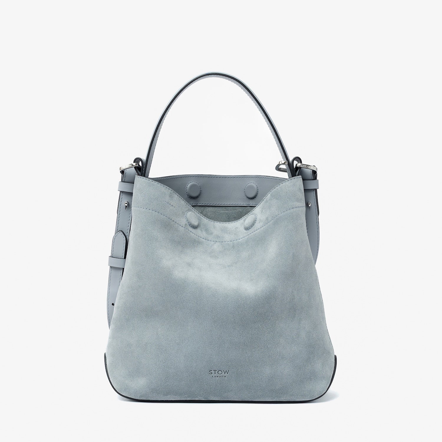 STOW London's Midi Curve in Misty Blue suede leather featuring silver stainless steel hardware on a light grey background