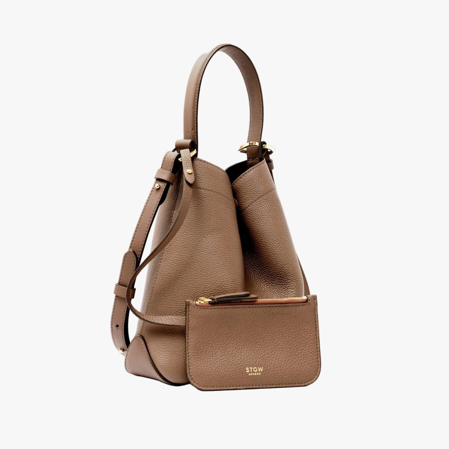 STOW London's Midi Curve bag in Mocha pebbled leather with its matching interior, detachable pouch featuring gold-coated stainless steel hardware on a light grey background