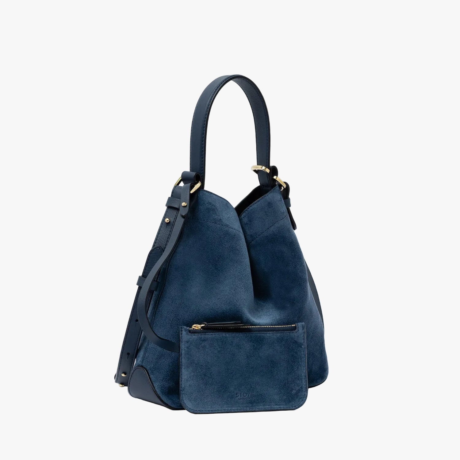 STOW London's Midi Curve in Navy suede leather with the matching, detachable interior pouch featuring gold-coated stainless steel hardware on a light grey background