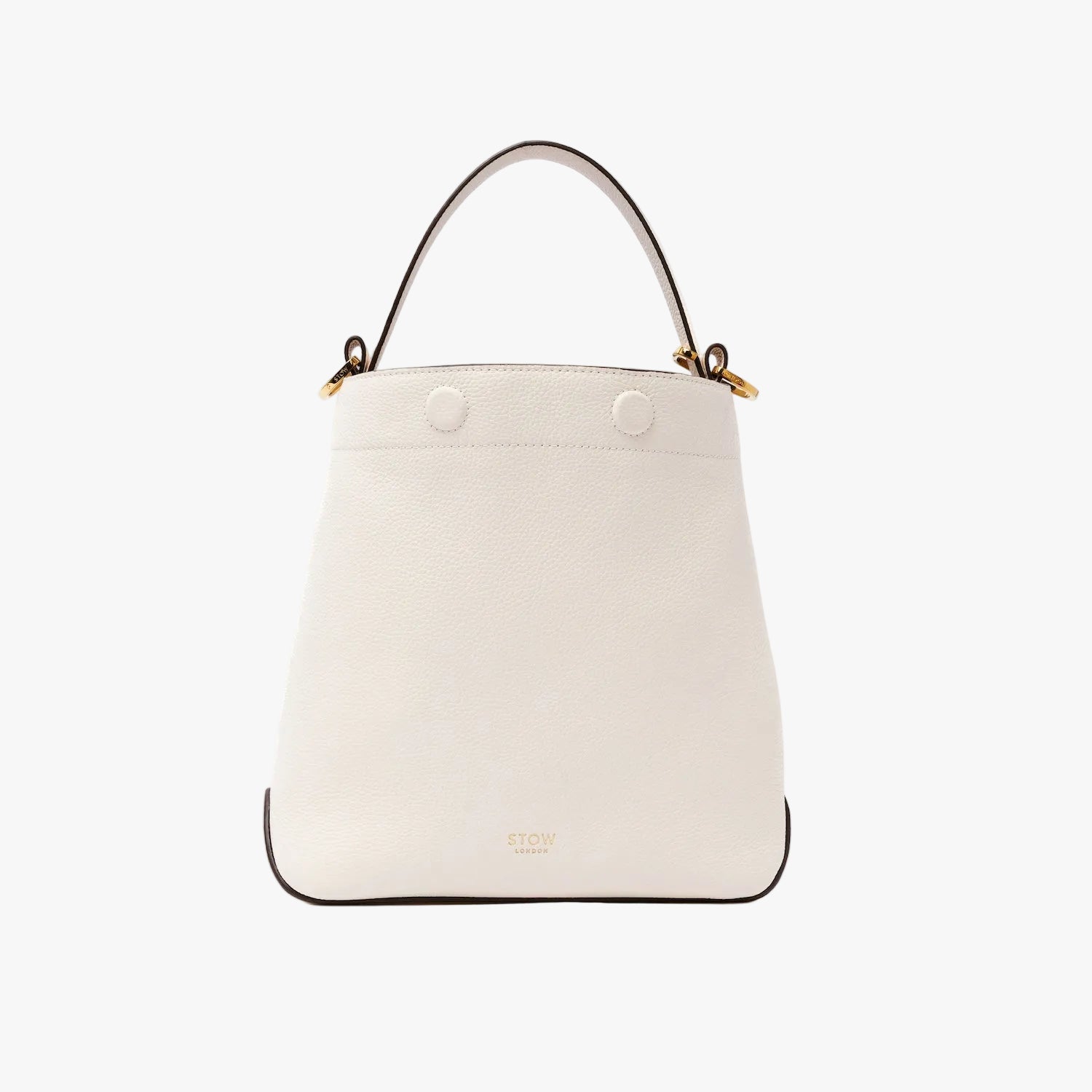 STOW London's Midi Curve in Spring Moon pebbled leather styled as a bucket bag featuring gold-coated stainless steel hardware on a light grey background