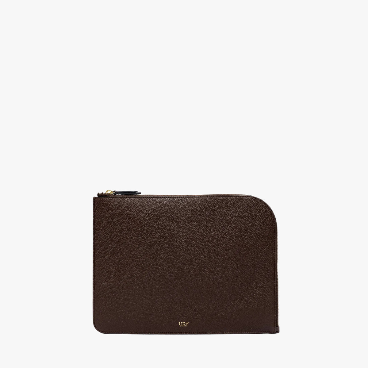 STOW London's Midi Leather Sleeve in Espresso pebbled leather on a light grey background featuring a YKK Natulon Zip and a fine gold embossed logo on the front bottom. 