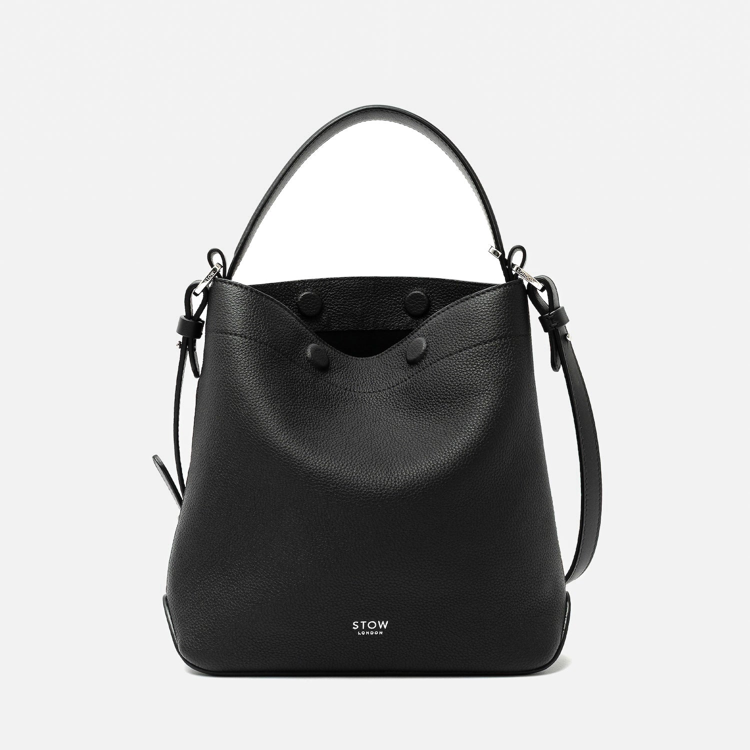 STOW London's Midi Curve in Black pebbled leather featuring silver stainless steel hardware on a light grey background