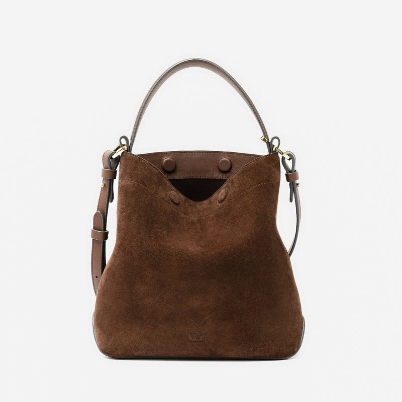STOW London's Midi Curve in Chocolate suede leather and detachable crossbody strap featuring gold-coated stainless steel hardware on a light grey background