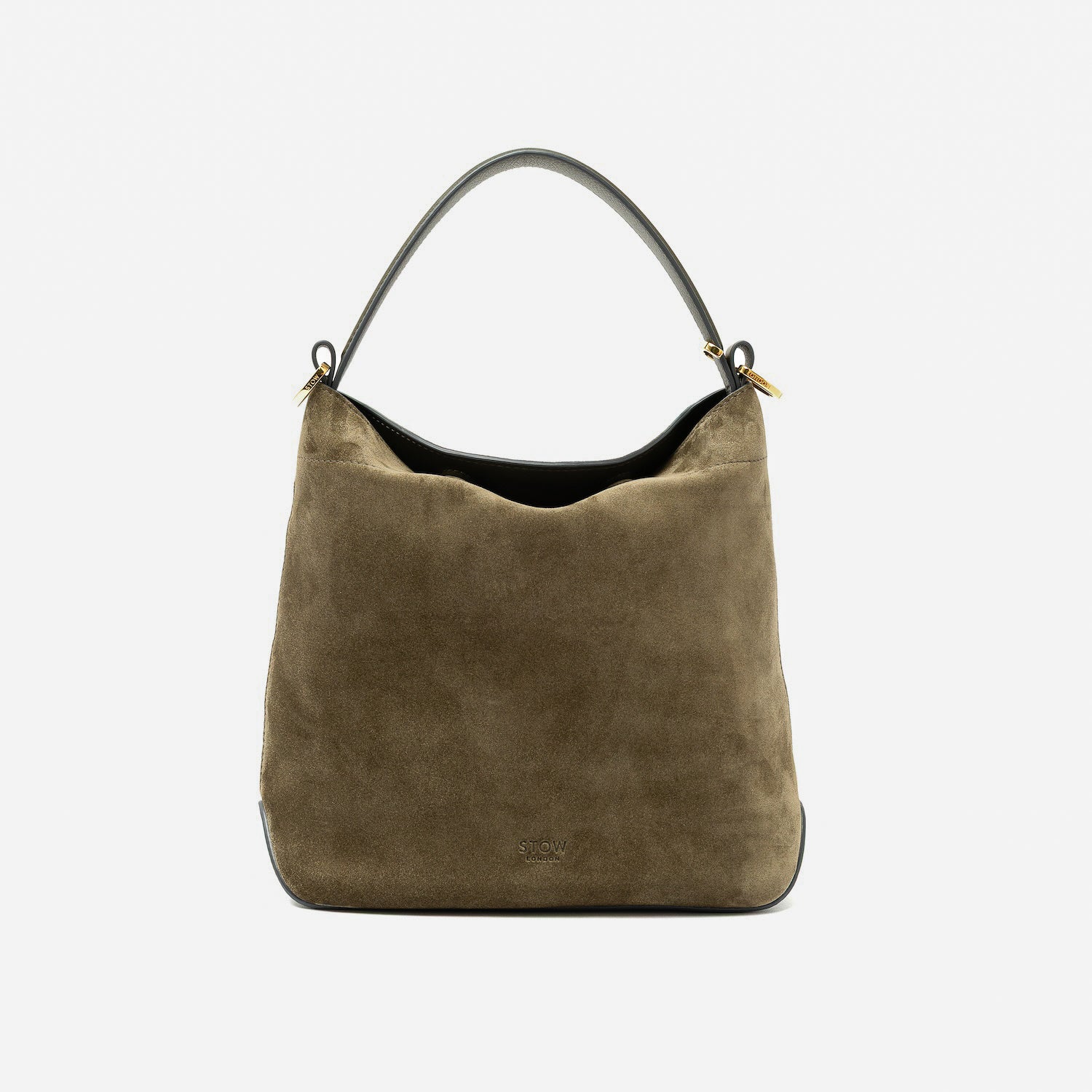 STOW London's Midi Curve in Dark Green suede leather styled as a flap bag featuring gold-coated stainless steel hardware on a light grey background