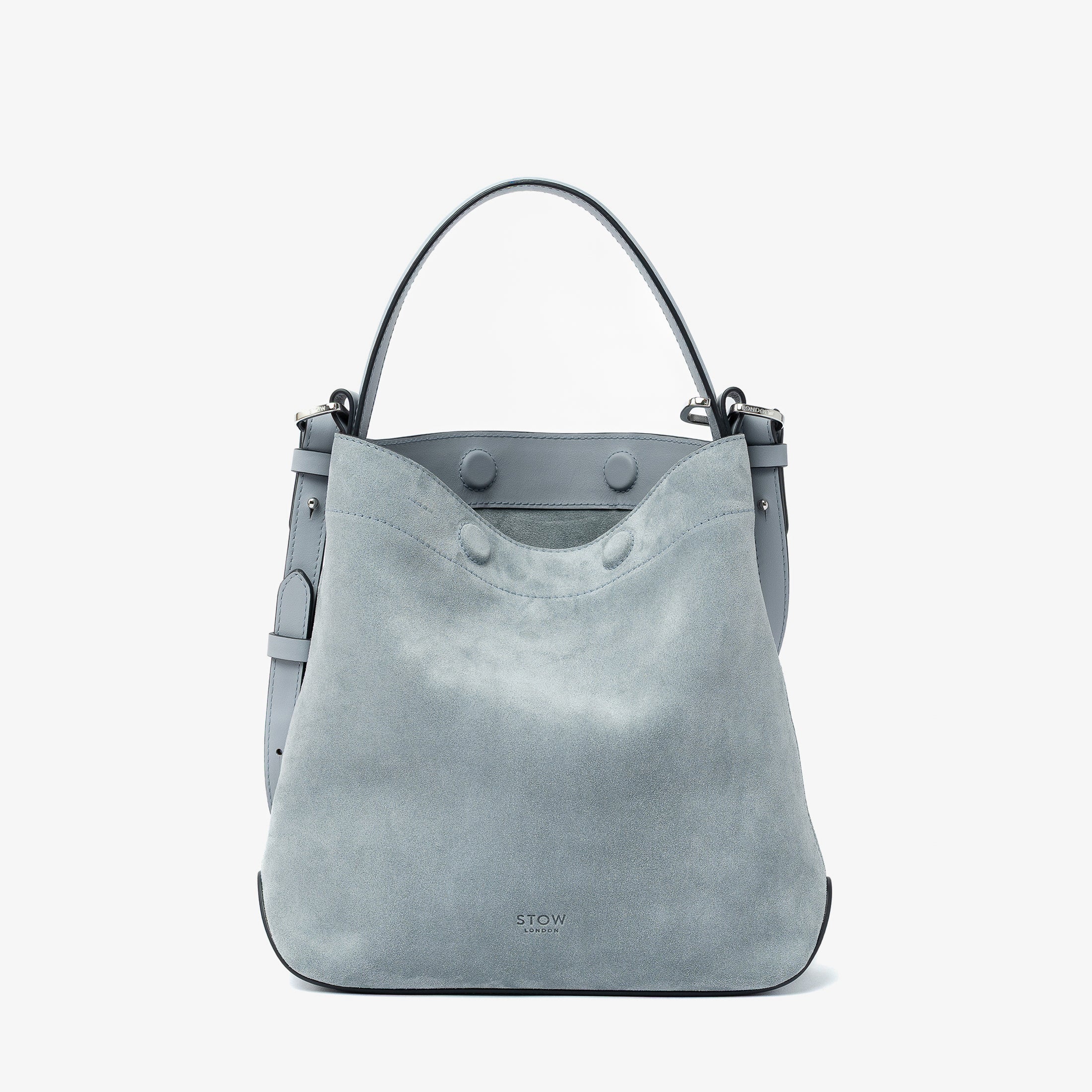 STOW London's Midi Curve in Misty Blue suede leather featuring silver stainless steel hardware on a light grey background