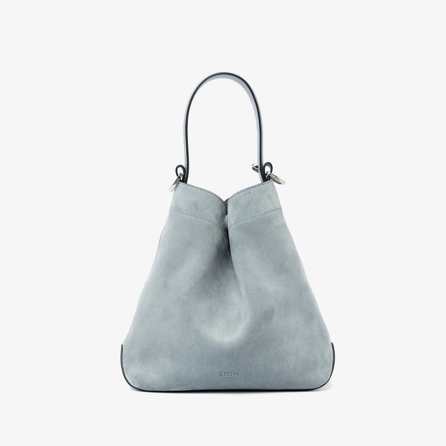 STOW London's Midi Curve in Misty Blue suede leather styled in a triangular shape featuring silver stainless steel hardware on a light grey background