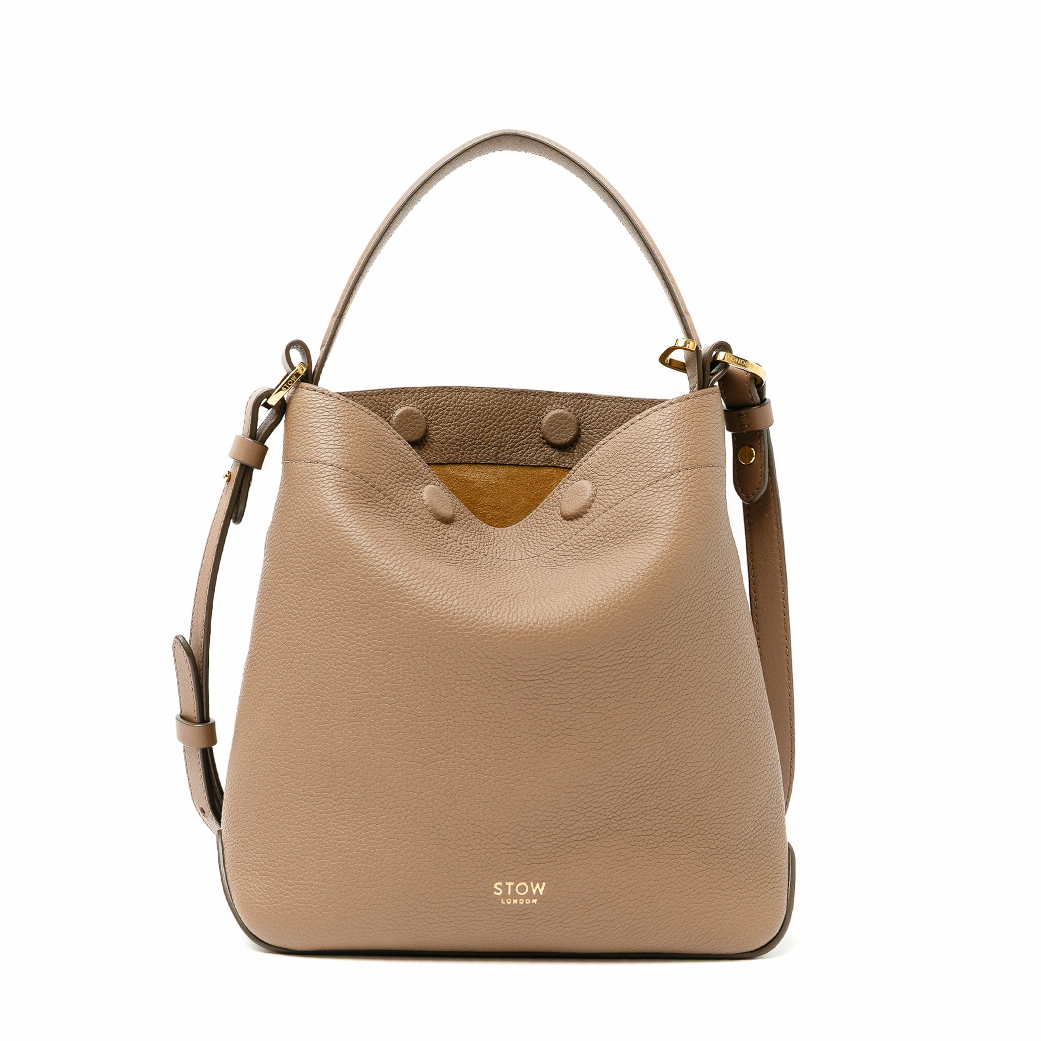STOW London's Midi Curve bag and detachable, adjustable strap in Mocha pebbled and smooth leather featuring gold-coated stainless steel hardware on a white background