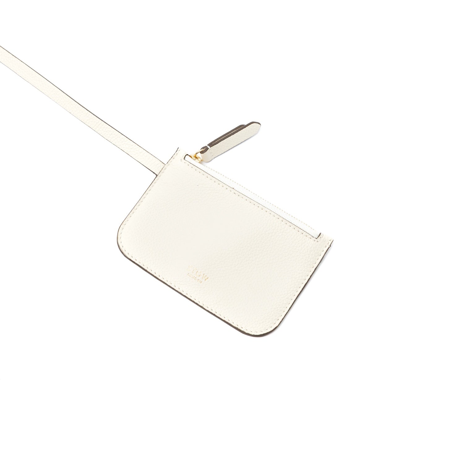 Interior, detachable pouch of STOW London's Midi Curve bag in Spring Moon pebbled and smooth leather featuring gold-coated stainless steel hardware on a white background