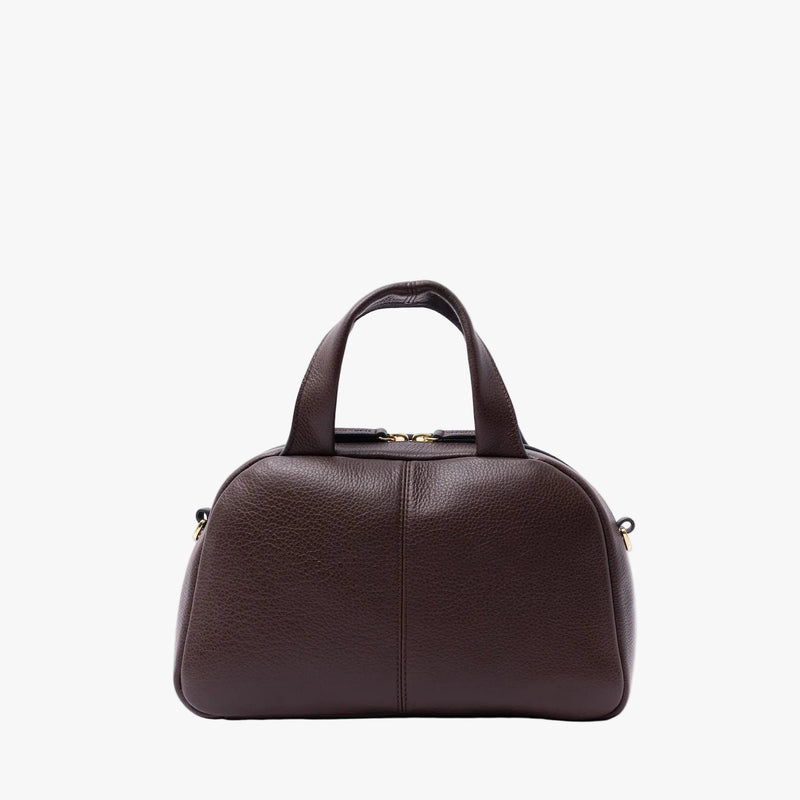 Back panel of STOW London's Mini Bowling in Espresso pebbled leather on a light grey background 