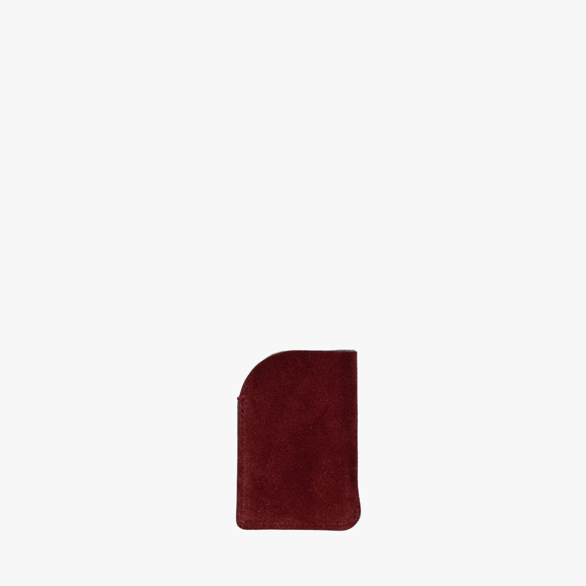 Back panel of STOW London's Mini Cardholder in Burgundy Suede leather on a light grey background