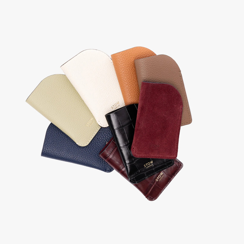 STOW London's Mini Cardholders range on a light grey background featuring a small gold embossed logo on the front bottom